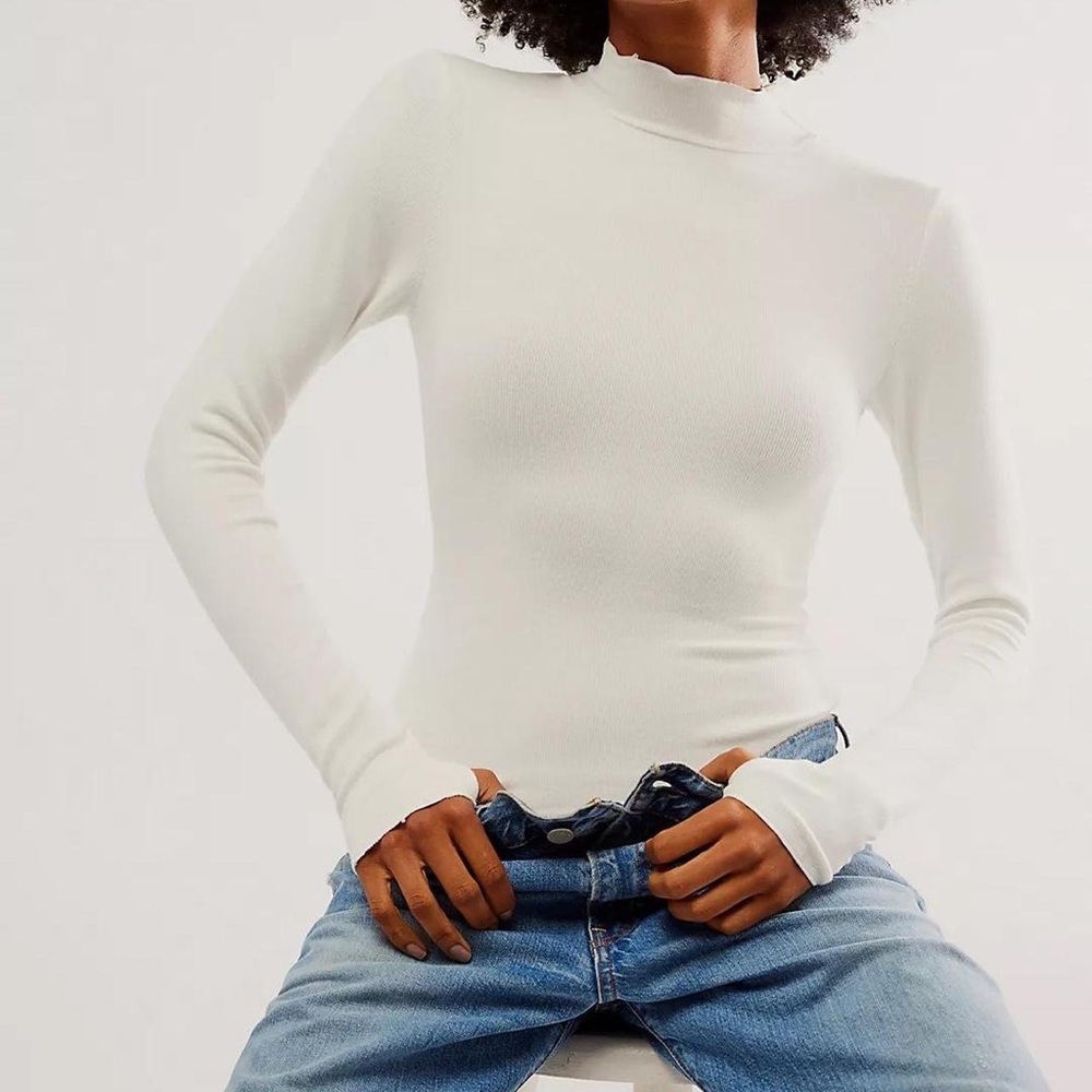 Free people super soft ruffled white bodysuit with mock neck.